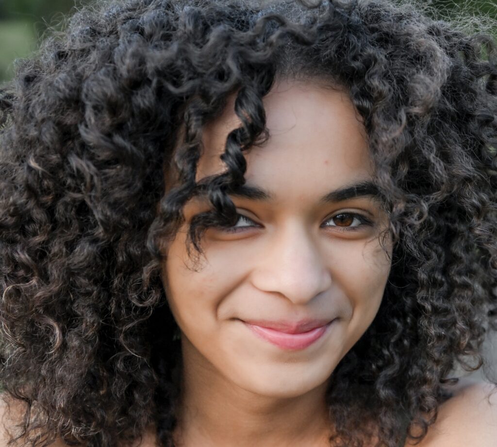 Image of W&M student smiling at the camera.