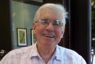 Picture of man smiling and looking at the camera,